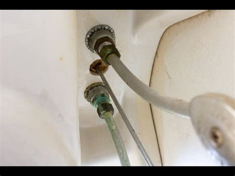 mixer tap leaking under sink|stop a leak in your tap handle or spout